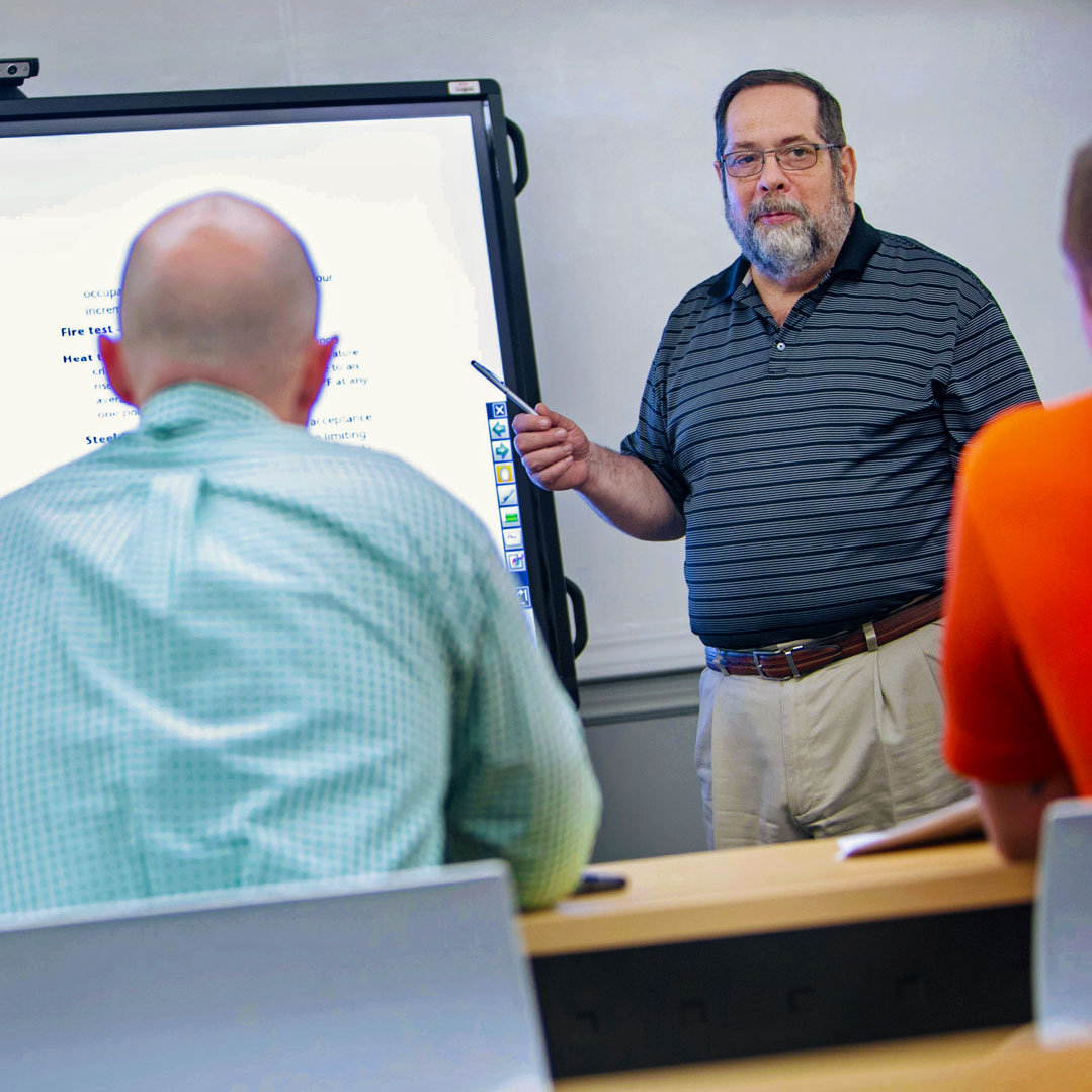 When they're not busy designing precast concrete buildings, our Engineers spend a lot time in the classroom learning the latest design codes and standards.